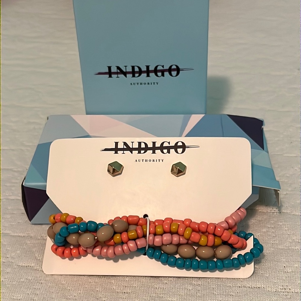 Indigo brand set. New. Colorful bead bracelet and gold earrings.